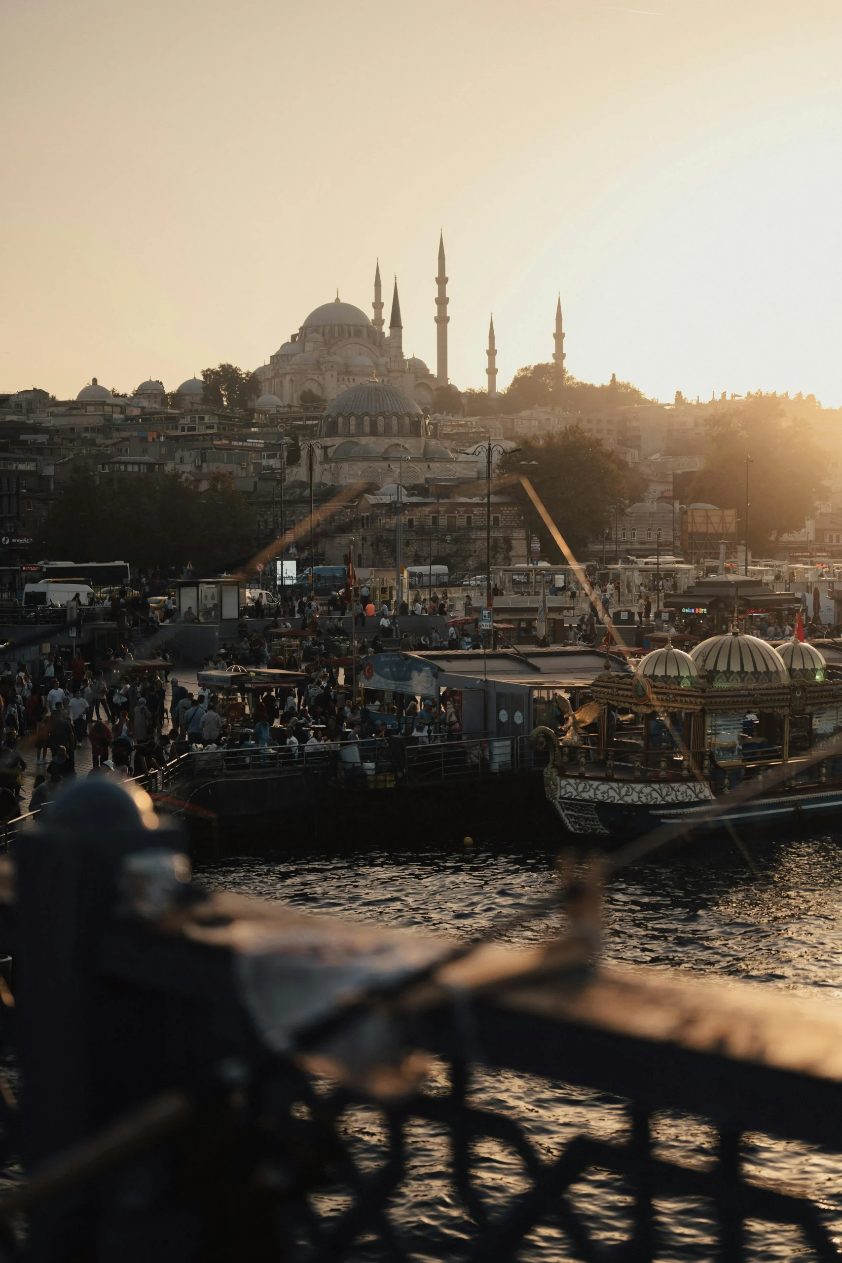 a portrait of Istanbul Bosphorus and there is people that fhisihing,